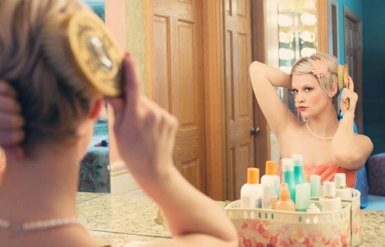 woman makeup in the mirror