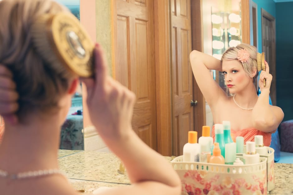 woman makeup in the mirror