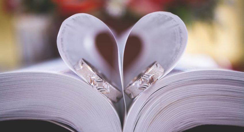 Wedding Planning advice heart paper with rings